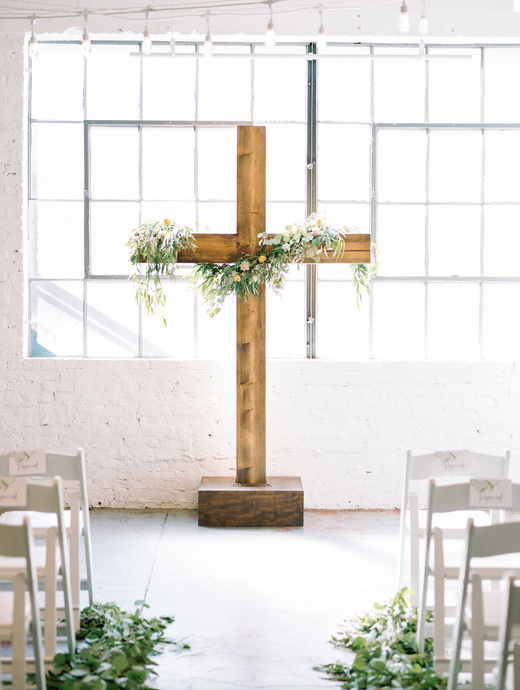 Ceremony Cross Flowers Cross Greenery Aislemark arrangements Wedding aisle Photography: DVandCo Venue: The Venue at Plenty